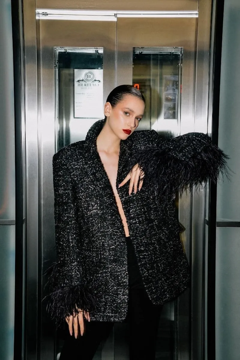 BLACK WOOL-BLEND JACKET WITH FEATHER-DETAILING