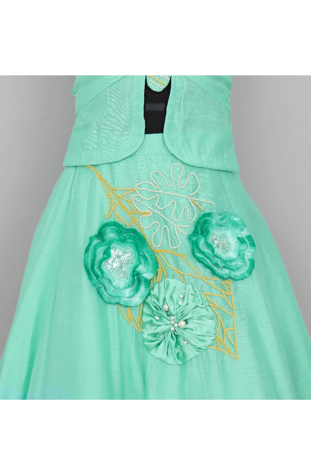 Green Silk Sleeveless Top With Embroidered Lehenga Set